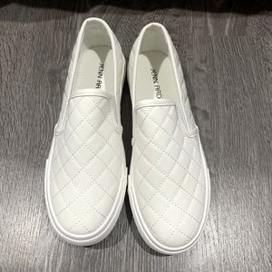 Brand new white slip on shoes